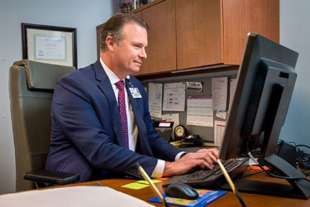 Dave Nall working at the computer