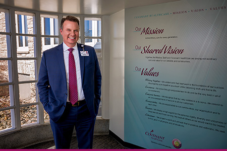 Dave Nall pictured with the Mission, Vision, and Values Statement
