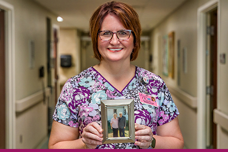 Sara Nitz with a photo of her grandparents